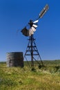 Old windmill with water tank Royalty Free Stock Photo