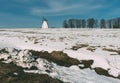 Old windmill winter scene