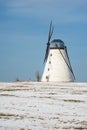 Old windmill winter scene