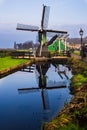 Old windmill in the winter. Village Zaanse Schans, Netherlands. Royalty Free Stock Photo