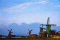 Old windmill in the winter. Village Zaanse Schans, Netherlands. Royalty Free Stock Photo