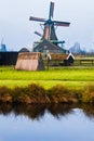 Old windmill in the winter. Village Zaanse Schans, Netherlands. Royalty Free Stock Photo