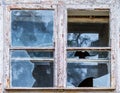 Old window with broken glass Royalty Free Stock Photo
