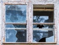 Old window with broken glass