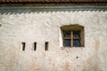 Old window in the castle wall Royalty Free Stock Photo