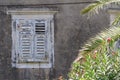 Old window closed with shutters. Europe Royalty Free Stock Photo