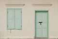 Old window and door on color wall thai style, vintage tone class Royalty Free Stock Photo