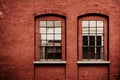 Old window frame with steel bars shutter exterior as prison or residential apartment front view. Weathered house wall