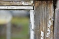 Old window frames and rotten arms and hinges Royalty Free Stock Photo