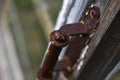 Old window frames and rotten arms and hinges Royalty Free Stock Photo