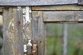 Old window frames and rotten arms and hinges Royalty Free Stock Photo