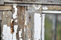 Old window frames and rotten arms and hinges Royalty Free Stock Photo