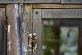 Old window frames and rotten arms and hinges Royalty Free Stock Photo