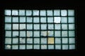 Old window of glass blocks in an abandoned building Royalty Free Stock Photo