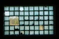 Old window of glass blocks in an abandoned building Royalty Free Stock Photo