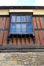 Looking up at an old tudor window Royalty Free Stock Photo