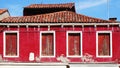 Old window house and roof with red wall Royalty Free Stock Photo