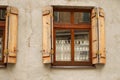 Old window with open wooden shutters. Texture background, window on the wall of a stone house wooden window shutters Royalty Free Stock Photo