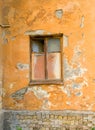 Old Window on Peeling Wall of Historic Building Royalty Free Stock Photo