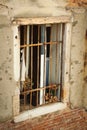 Old window with rusty lattice in Venice Royalty Free Stock Photo