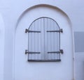 Old window with shutters in a historic medieval house. Europe, Latvia, Riga, Old town. Royalty Free Stock Photo