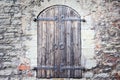 Old window shutters with metal bars Royalty Free Stock Photo