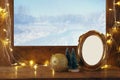 Old window sill with gold christmas lights Royalty Free Stock Photo