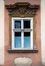 Old window with stone decoration Royalty Free Stock Photo