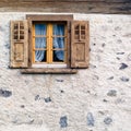 Old window in stone wall Royalty Free Stock Photo