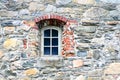 Old window and stone wall Royalty Free Stock Photo