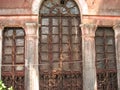 old window with terra-cotta tiled roof. An architectural details from Goa, India. Royalty Free Stock Photo