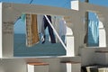 Atlantic view through an old wall, Nazare, Centro - Portugal Royalty Free Stock Photo