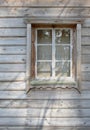 The old window in the wooden gouse wall Royalty Free Stock Photo