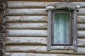 Old window in an wooden log house Royalty Free Stock Photo