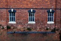 Old Windows on Brick Wall Royalty Free Stock Photo