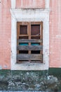Old Windows with broken glass and broken frames in the old house. Royalty Free Stock Photo
