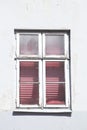 Old windows with closed shutters Royalty Free Stock Photo