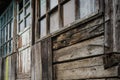 Old Windows and cracked wooden wall Royalty Free Stock Photo