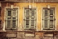 Old windows and shutters. Vintage background and texture. Old french shutters. Royalty Free Stock Photo
