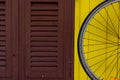 Old windows wood and Bike wheels Royalty Free Stock Photo