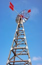 An old windpump against the blue sky Royalty Free Stock Photo