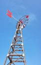 An old windpump against the blue sky Royalty Free Stock Photo