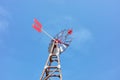 An old windpump against the blue sky Royalty Free Stock Photo