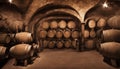 Old wine barrels, casks and bottles in wine-cellar