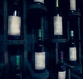 Old wine bottles on the wine shelf. Wine cellar. Royalty Free Stock Photo