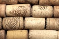 Old wine corks from red wine among used wine corks from white wine Royalty Free Stock Photo