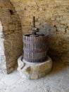 Old wine press  used to crush the bunches of grapes Royalty Free Stock Photo