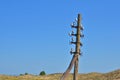 Old wireless electricity pylon or telephone pole Royalty Free Stock Photo