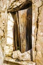 Old wodden window shutter of traditional house in the village Chamaitoulo, Crete, Greece Royalty Free Stock Photo