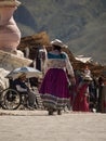 Old woman in andes town village Achoma wearing traditional indigenous handwoven colorful dress costume Colca Canyon Peru